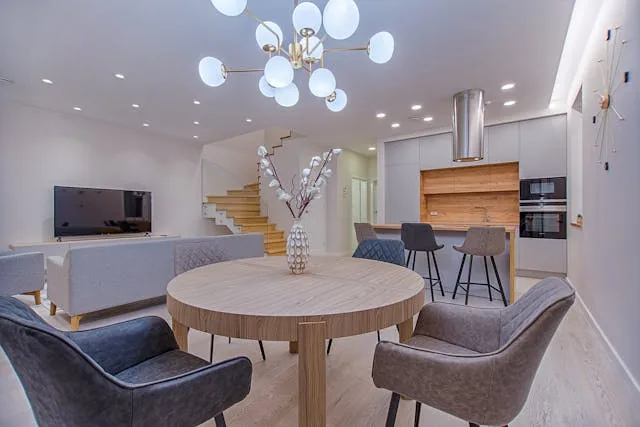 living room with grey chair and wooden table (1)